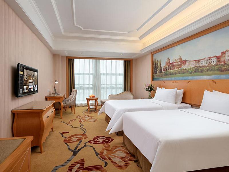 Vienna International Hotel Jiujiang Shili Street Extérieur photo